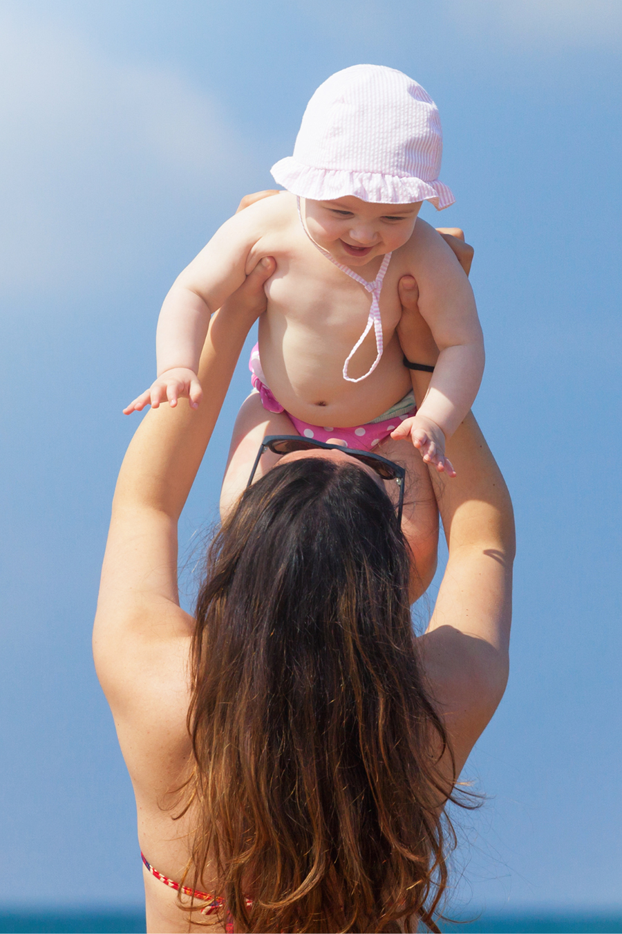 woman holding newborn baby